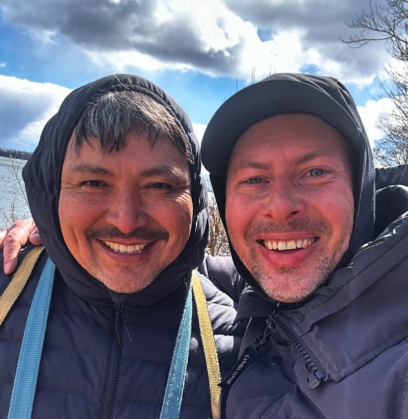 Abraham and Max grinning on a winter walk